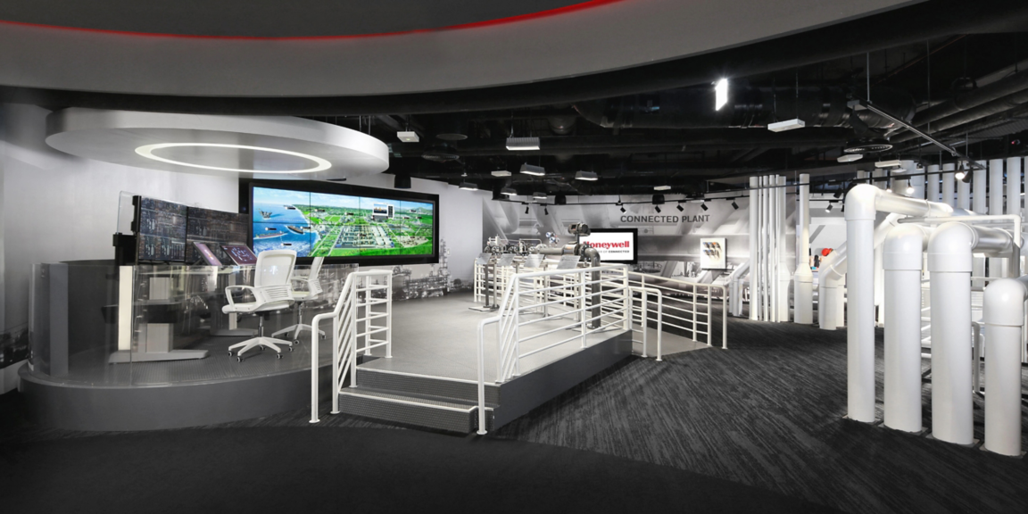 Industrial exhibit highlighting Honeywell connected plant systems, automation technologies, and operational excellence tools for manufacturing environments.