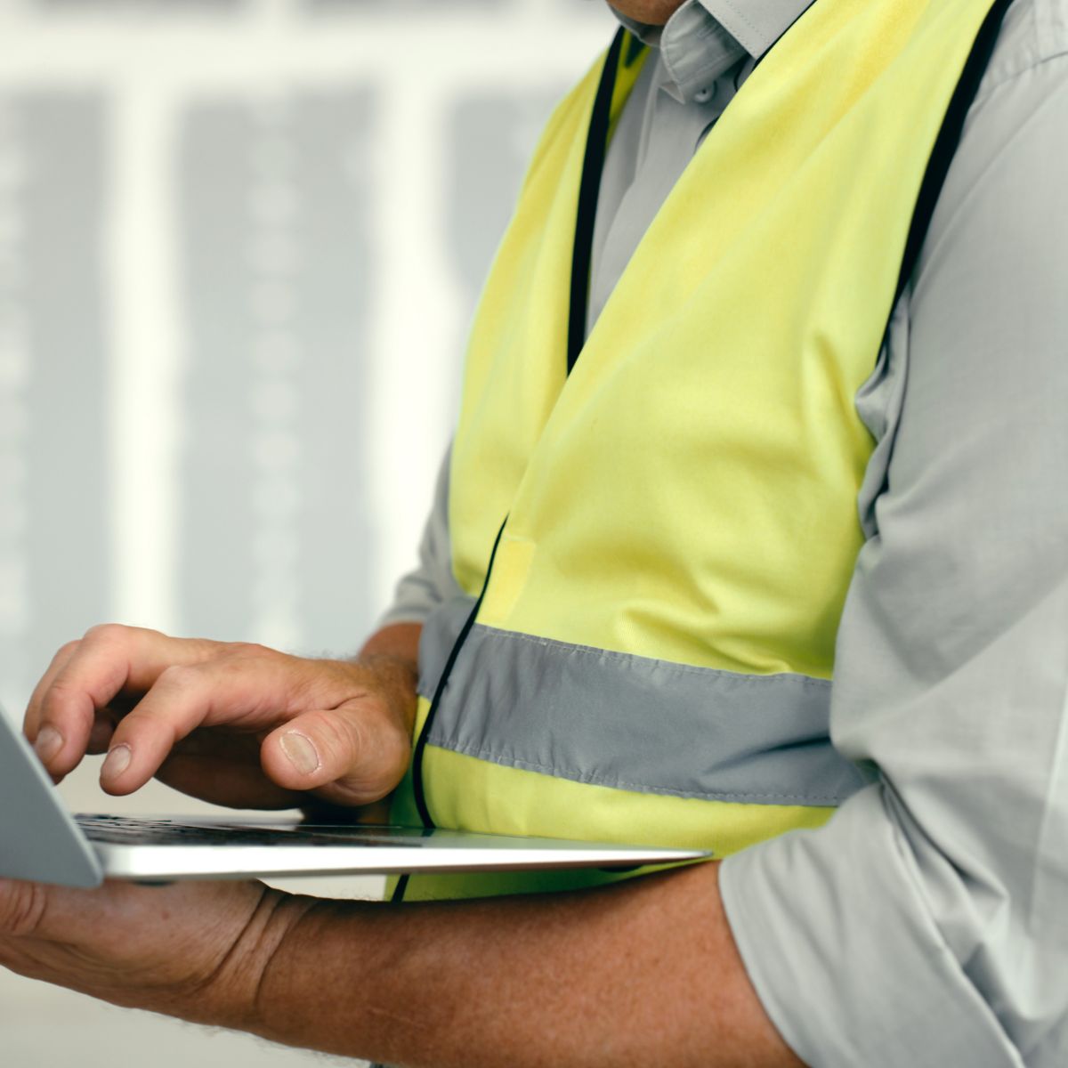 Laptop, planning and construction worker hands for engineering software, paperless project management or innovation building site. Architect contractor or technician pc for industrial design progress