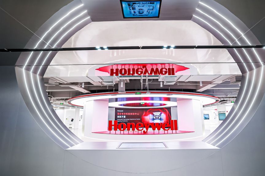 Explore Honeywell’s smart building automation solutions featuring safety systems, operational efficiency tools, and sustainability technologies in an advanced technology showroom.