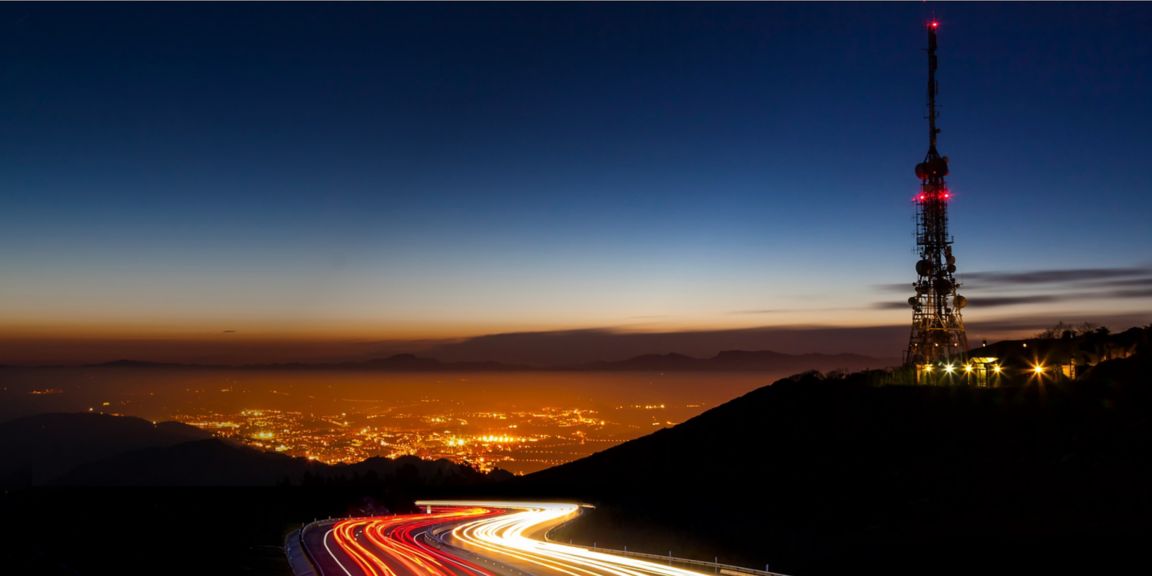 Highway to city at night