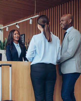 Couple at hotel check in