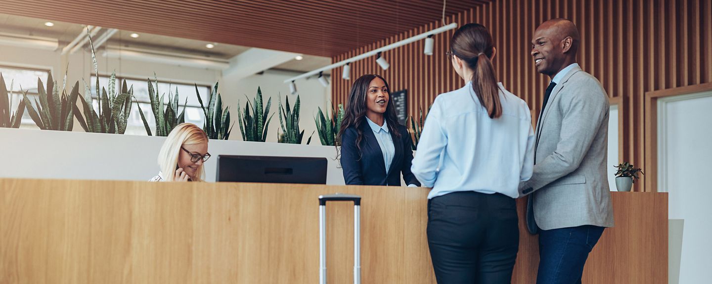 Couple at hotel check in