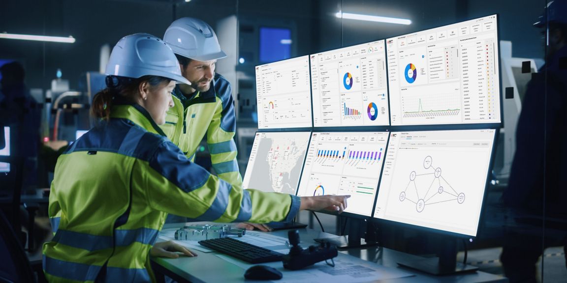 Industry 4.0 Modern Factory: Project Engineer Talks to Female Operator who Controls Facility Production Line, Uses Computer with Screens Showing AI, Machine Learning Enhanced Assembly Process