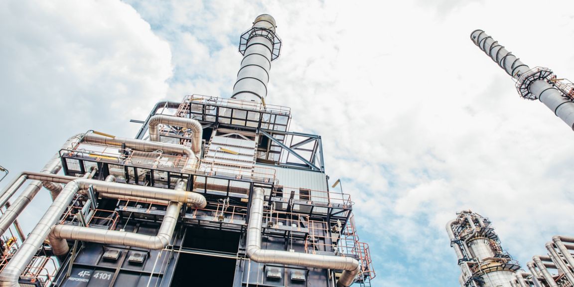 Industrial zone,The equipment of oil refining,Close-up of industrial pipelines of an oil-refinery plant,Detail of oil pipeline with valves in large oil refinery.