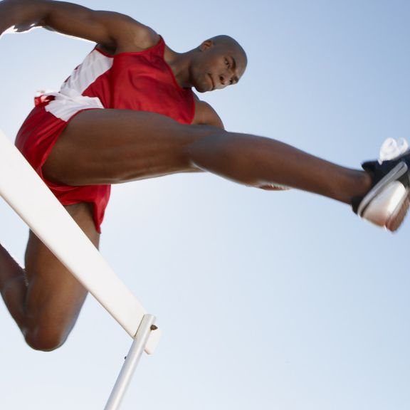 Hurdler jumping