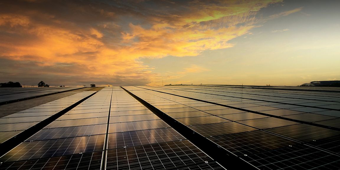 solar panels on roof and sky background