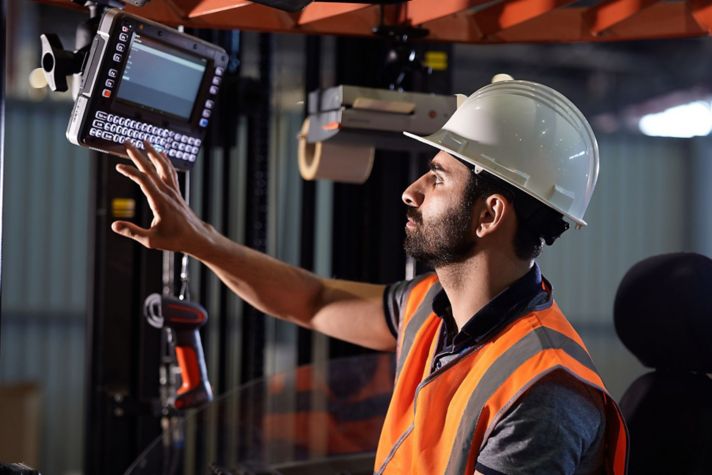 worker using a vehicle mounted computer