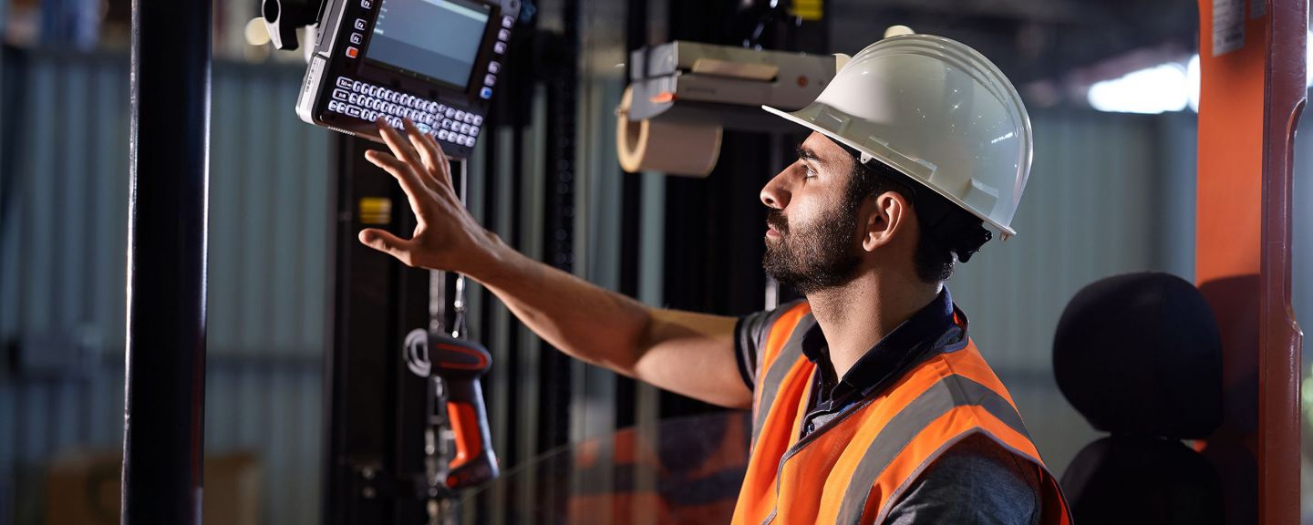 worker using a vehicle mounted computer