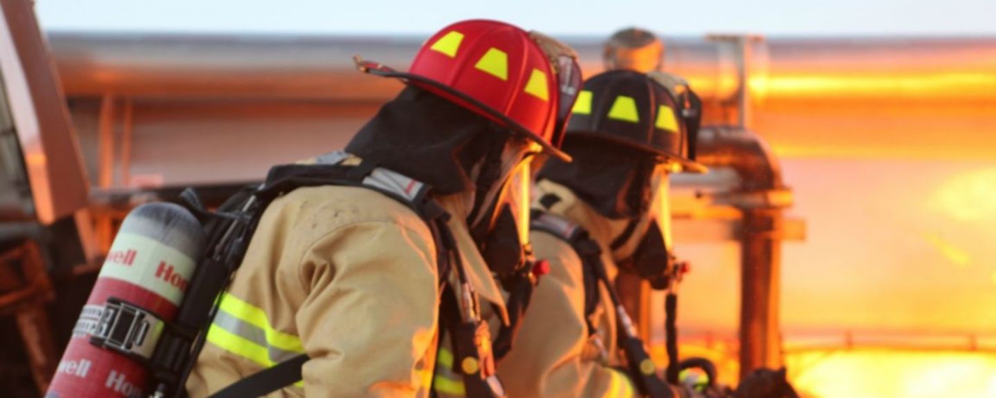 firefighters trying to stop a fire hero