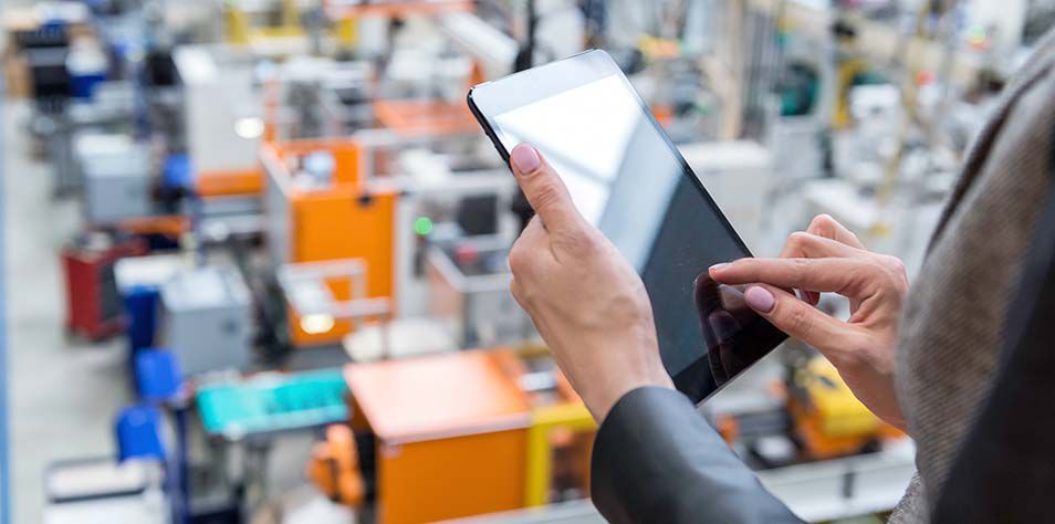 Person working on tablet in distribution center