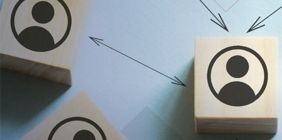 Boxes with people icons connected by arrows