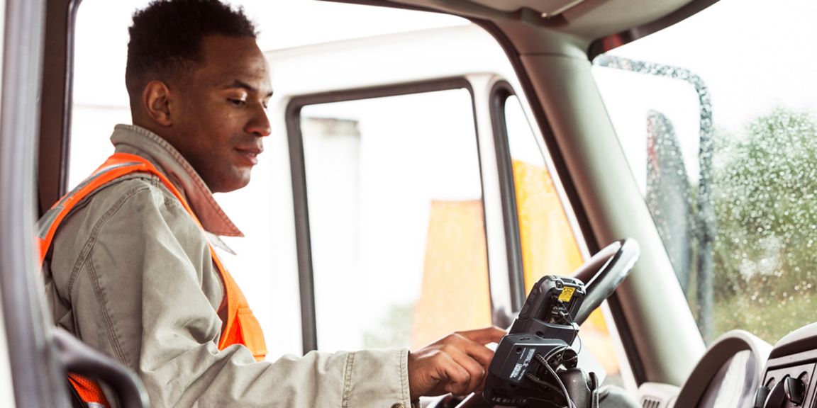 driver checking a device