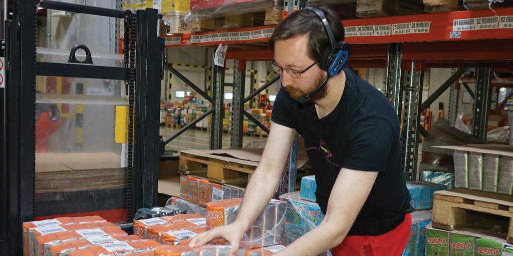 worker wearing voice device