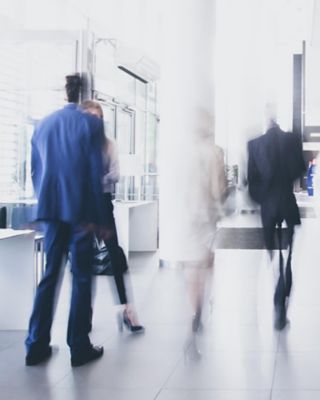 Visitors walking inside building