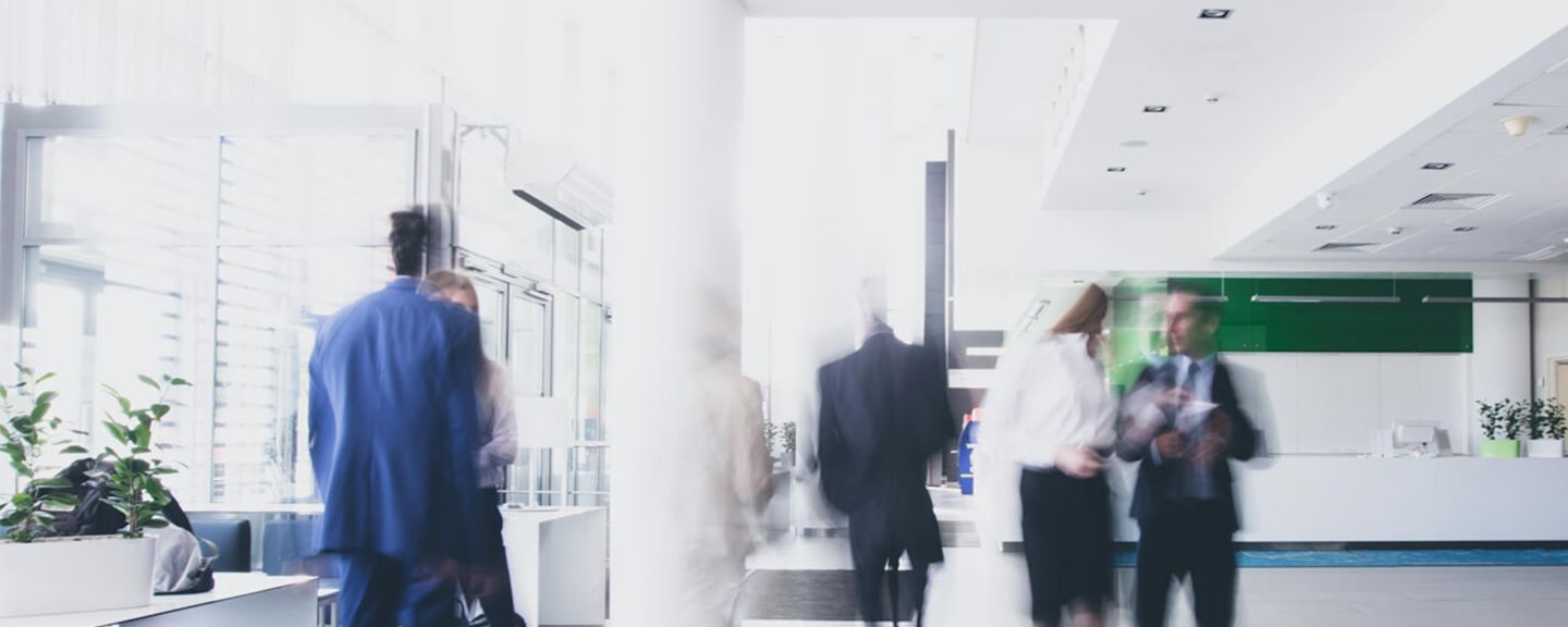 Visitors walking inside building
