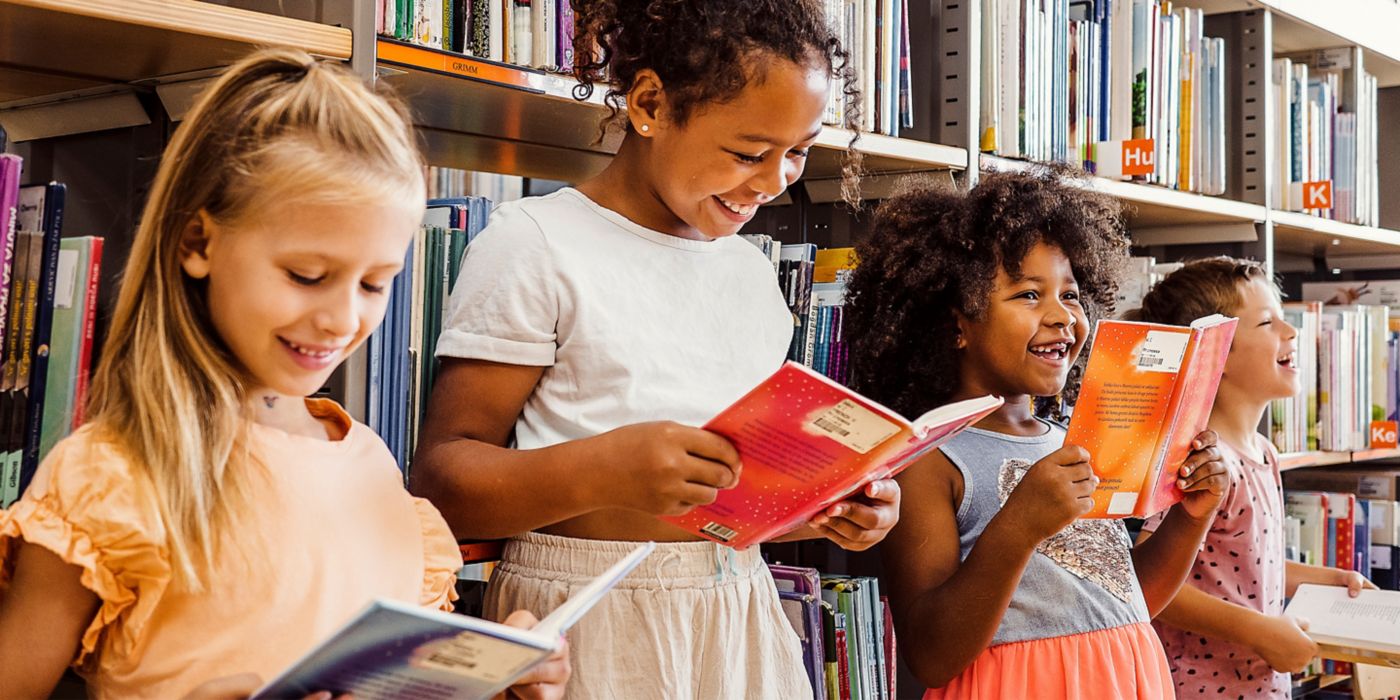 Children are reading books in the library