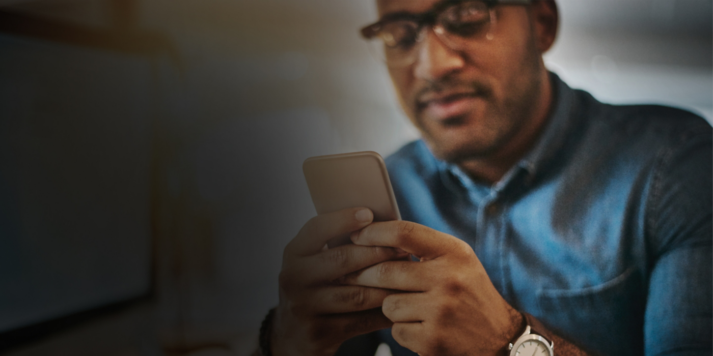 Man using handheld device