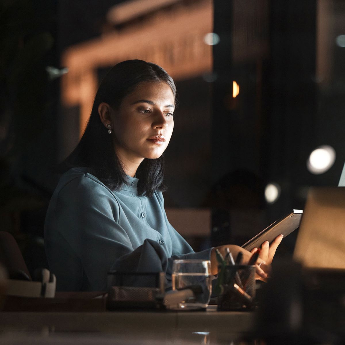 A lady in front of monitor