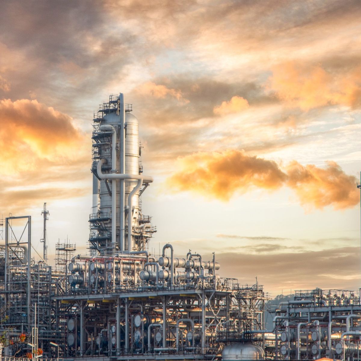 Oil and Gas Industrial zone,The equipment of oil refining,Close-up of industrial pipelines of an oil-refinery plant,Detail of oil pipeline with valves in large oil refinery.