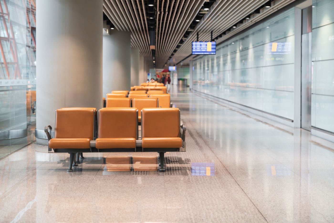Interior of airport view with well lighted benches