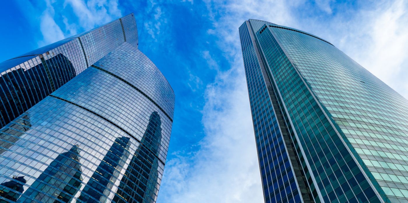 Moskva-city. Bottom view of the skyscrapers in the center of the Russian capital. Business center of Moscow. Office rental. Office real estate. High-rise buildings against the blue sky.; Shutterstock ID 1714622212; Function downloaded by: William Brahler; Project use: Stock Library; Brand if appropriate: ; Notes: 
