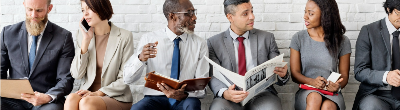 Business people consuming news