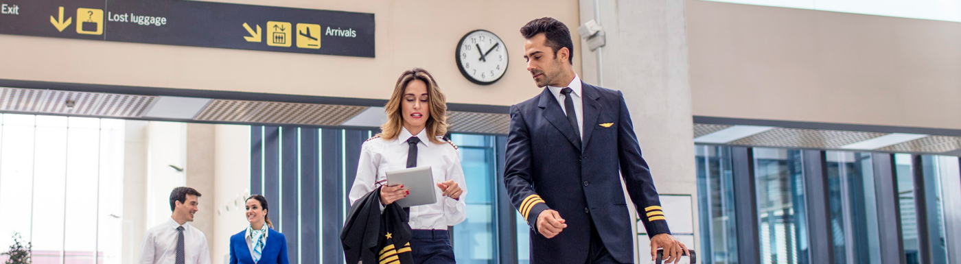 Pilots walking in an airport