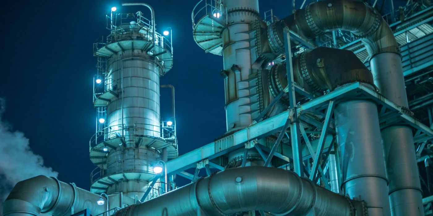 Details of large factory at night
