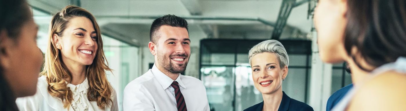 People in a meeting shaking hands