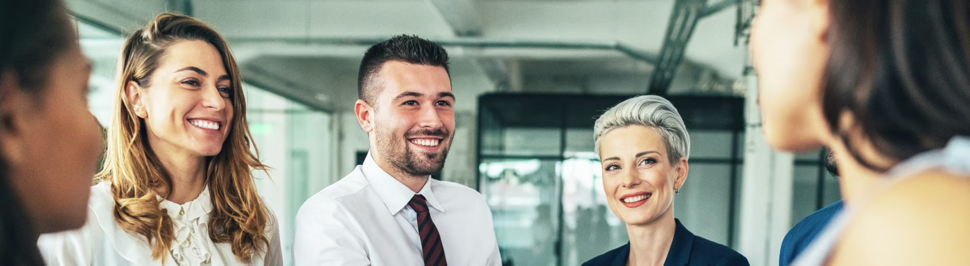 People in a meeting shaking hands