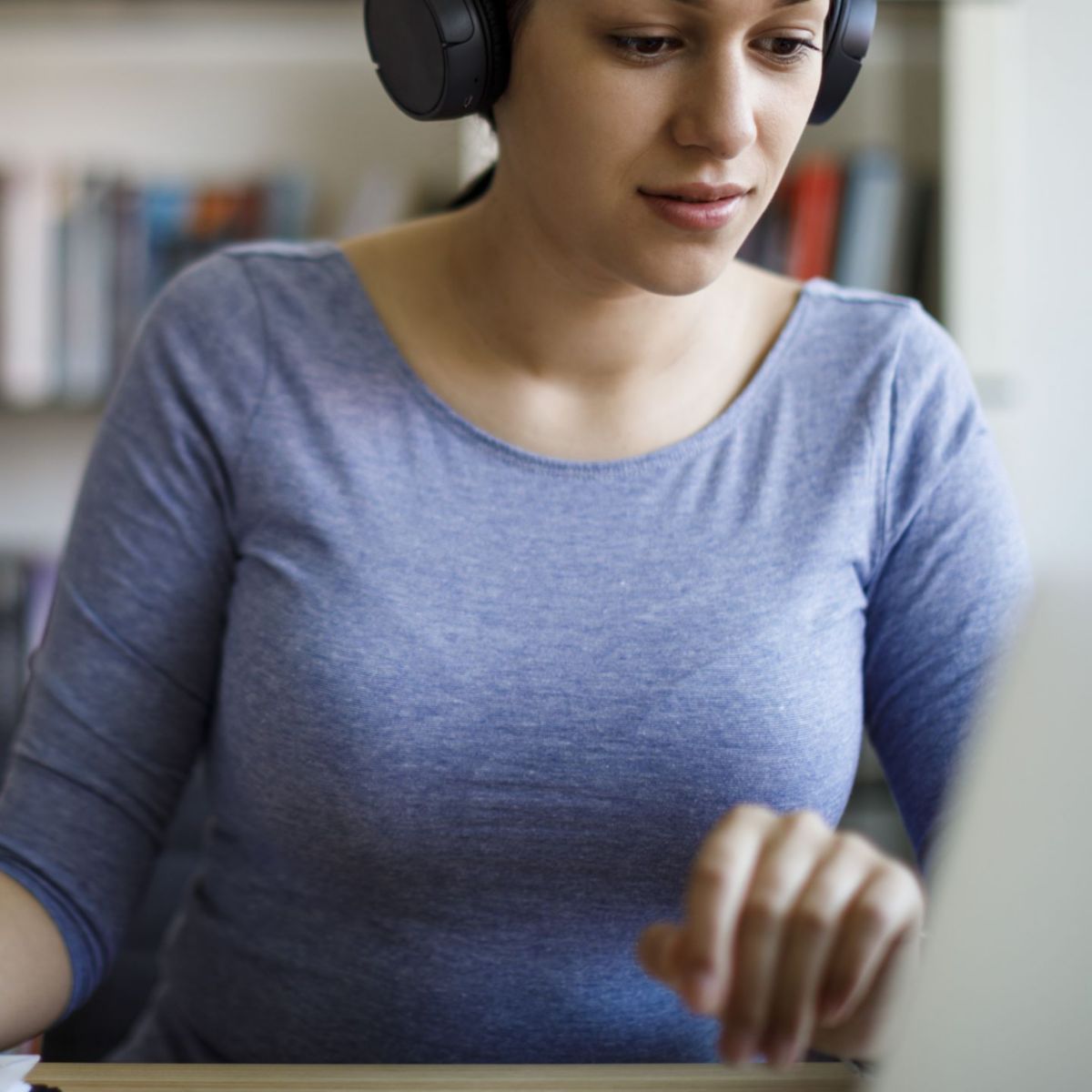 Young female working at home office