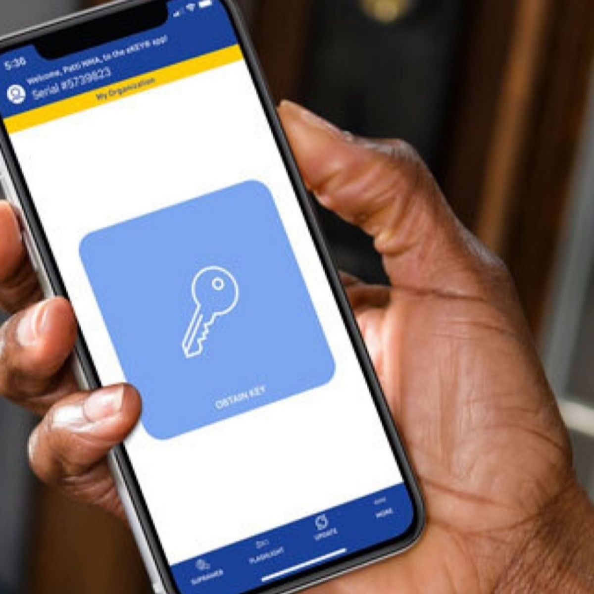Supra eKEY app with large obtain key button for managed access on mobile phone.
