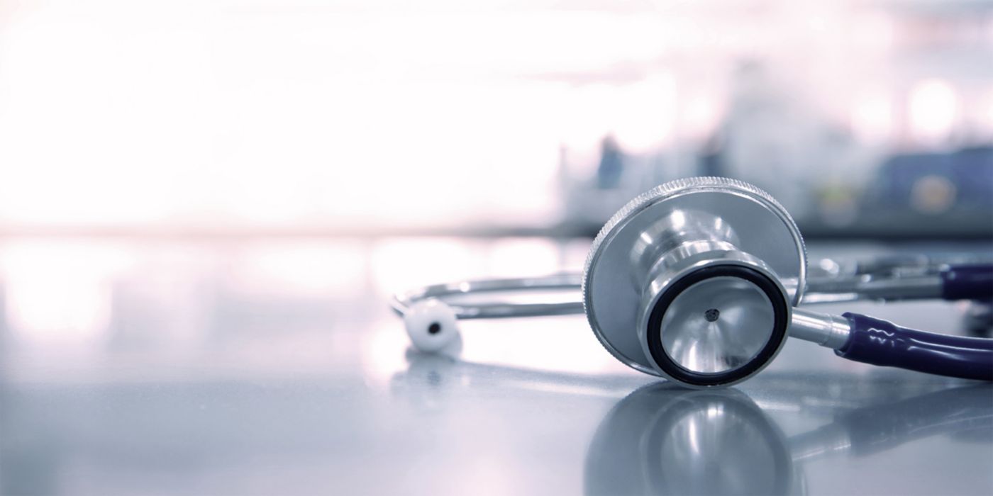 stethoscope for doctor checkup on health medical laboratory table background