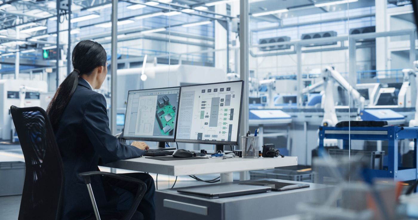 hon-engineer-analyzing-circuit-boards-getty-2167548407.jpg