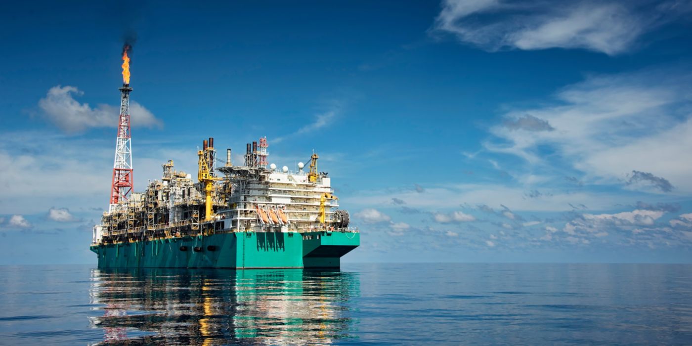 FLNG or floating  liquefied natural gas at sea with beautiful cloudy sky