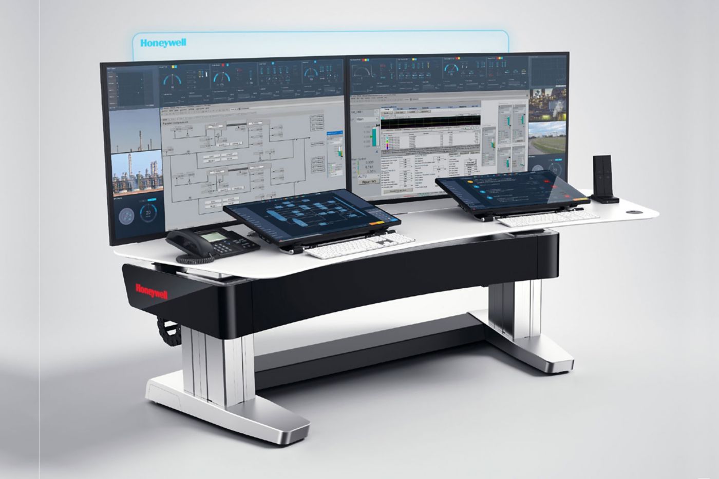 Advanced industrial control system workstation called Experion PKS with multiple displays and interfaces designed for monitoring and managing complex operations.