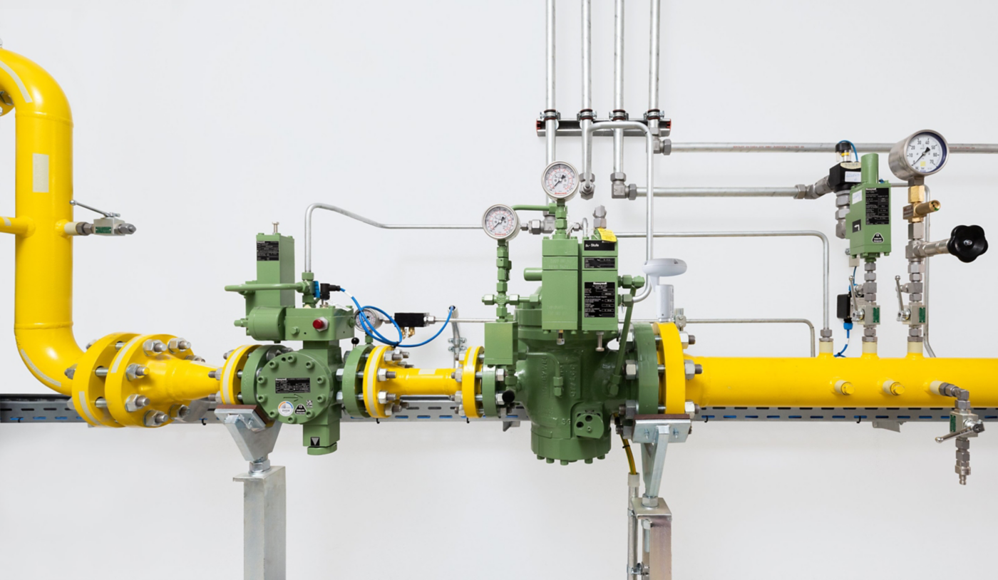 High-precision industrial gas piping system featuring integrated valves, pressure gauges, and measurement instrumentation on a clean white background.