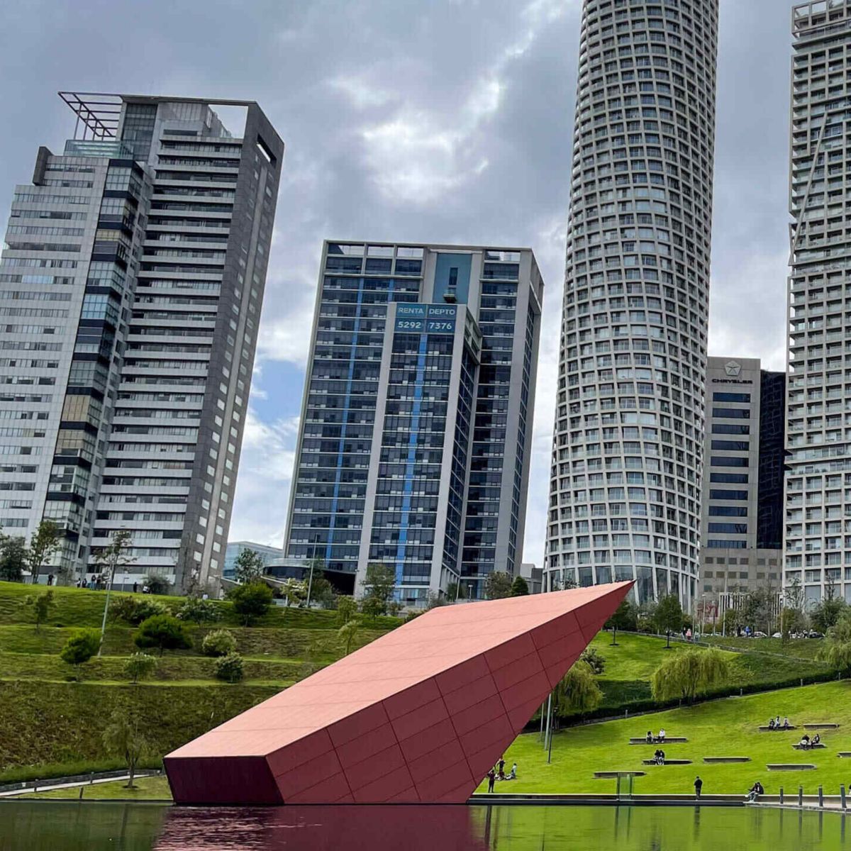 Discover Mexico City’s modern Santa Fe skyline with sleek high-rise towers and a vibrant urban park blending nature and contemporary architecture.