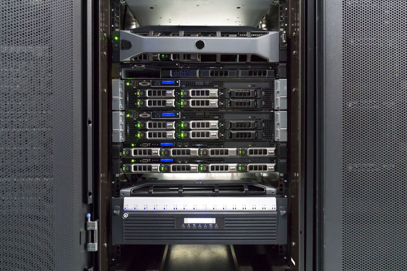  Image of organized server racks in a data center, showcasing multiple servers and their connections.