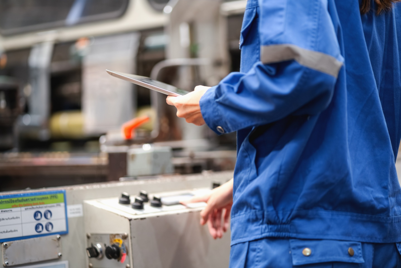 hon-technician-operating-industrial-machinery.jpg