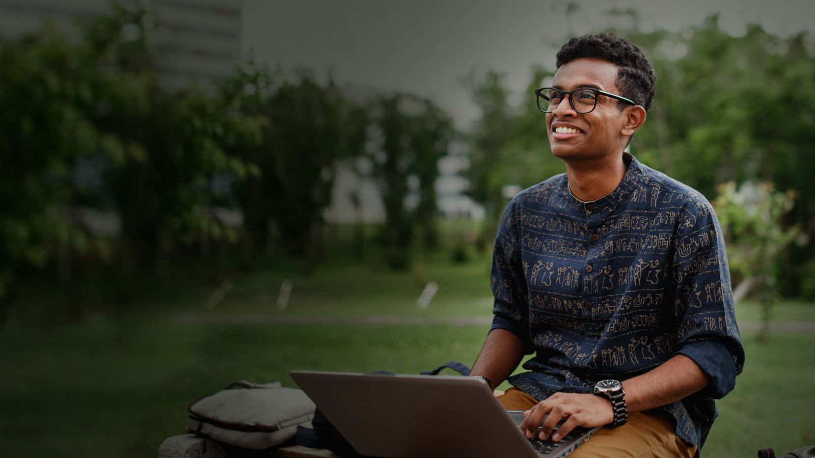 Image of student in courtyard