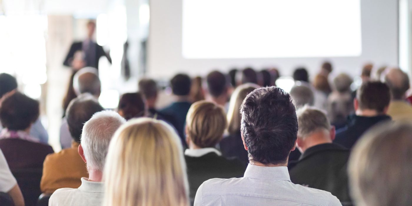 People at speaking event