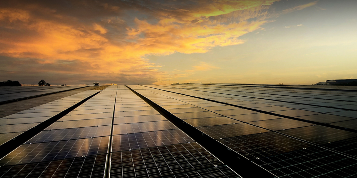 solar panels on roof and sky background