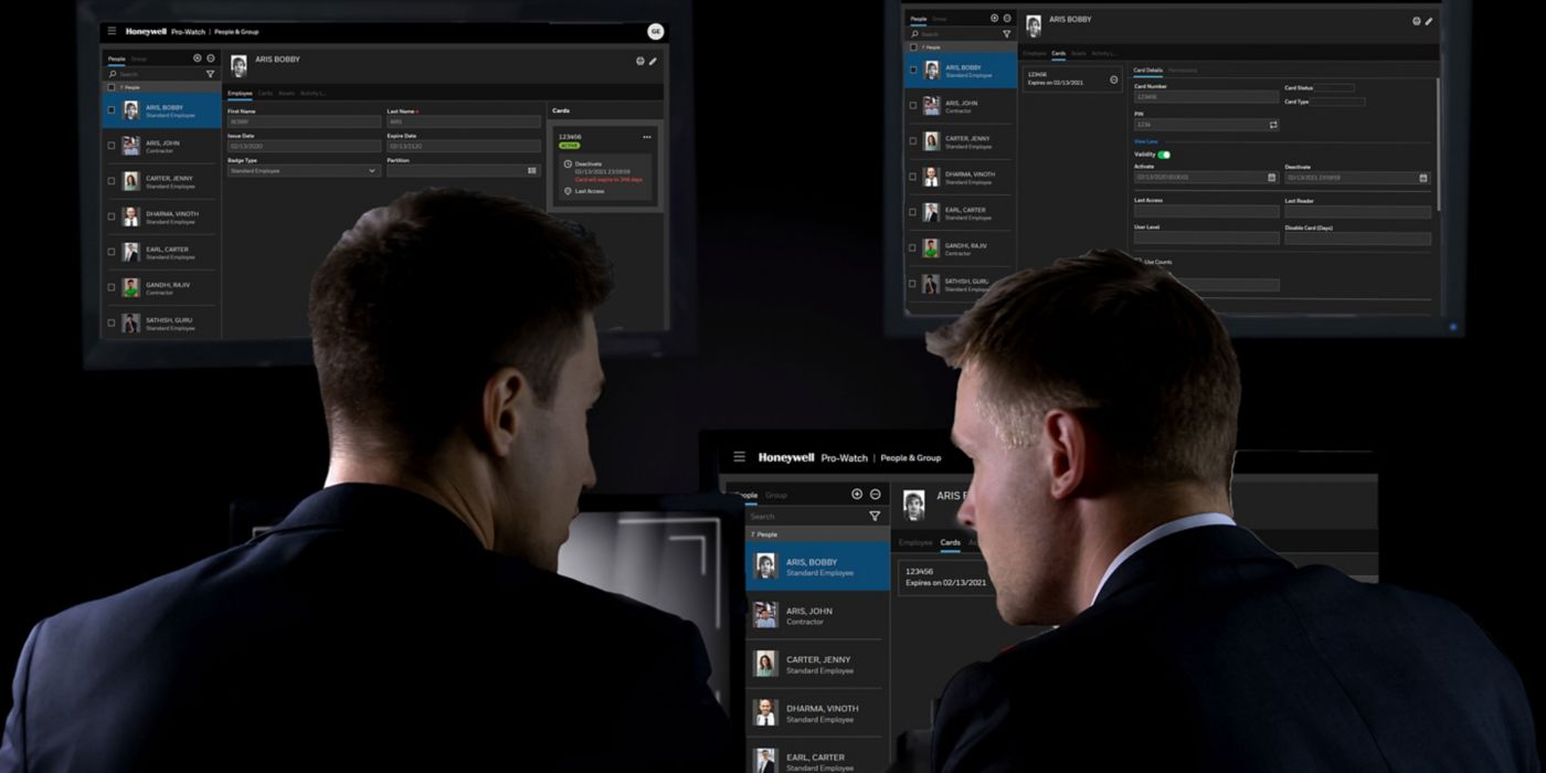 Two people looking at computer screens