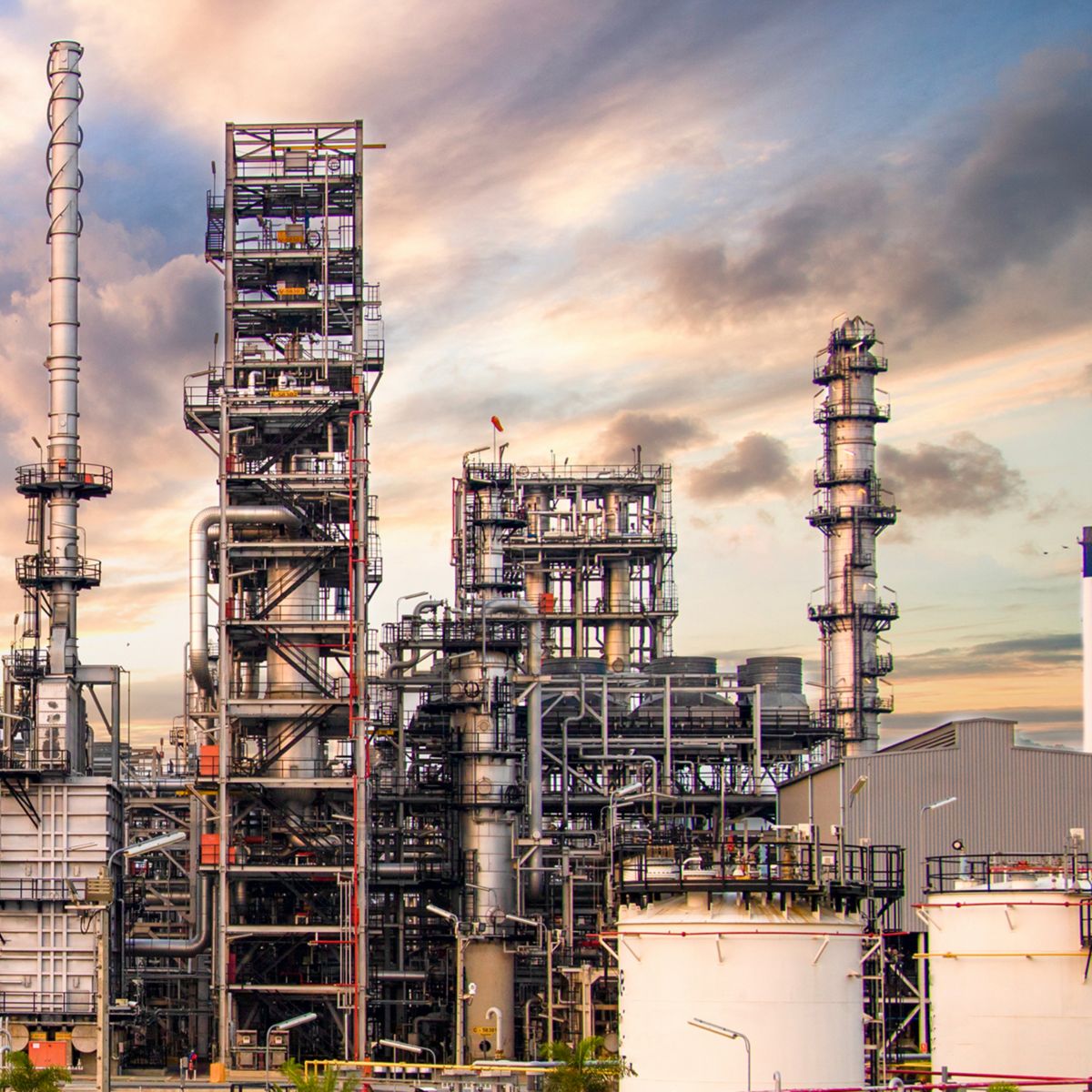 Oil and Gas Industrial zone,The equipment of oil refining,Close-up of industrial pipelines of an oil-refinery plant,Detail of oil pipeline with valves in large oil refinery.
